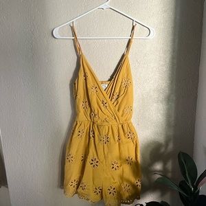 Francesca’s Yellow “blue rain” romper. Size S.